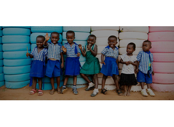 How did international NGO Thaakat reduce costs when sending funds abroad?